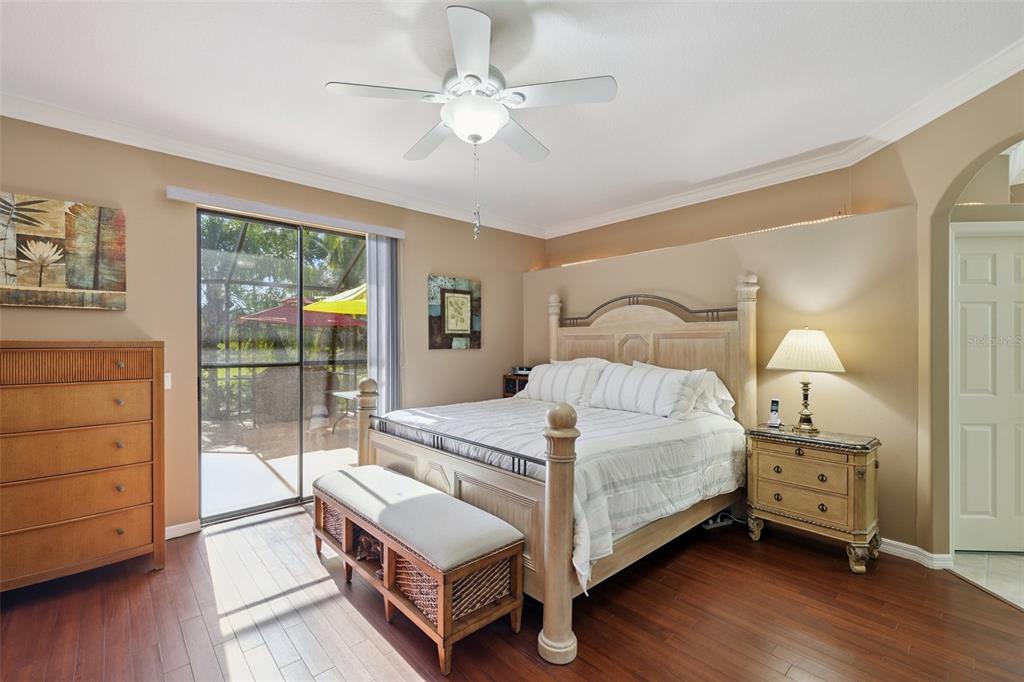 2002 Palm View Road Sarasota, FL 34240 - Photo 20 of 34 a bedroom with a bed a lamp and window