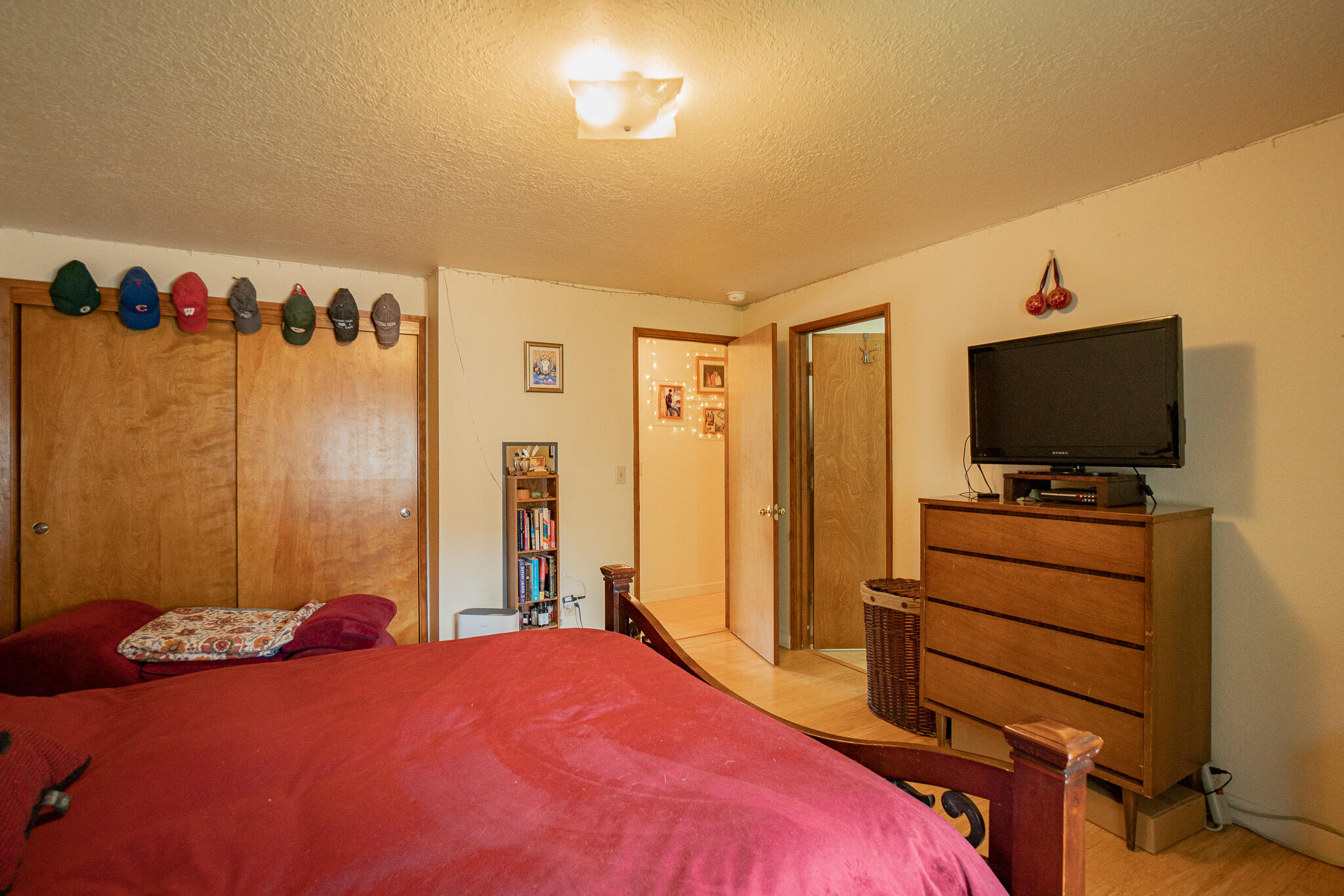 537 Bell Road Talent, OR 97540 - Photo 17 of 23 a bedroom with a bed and a flat screen tv