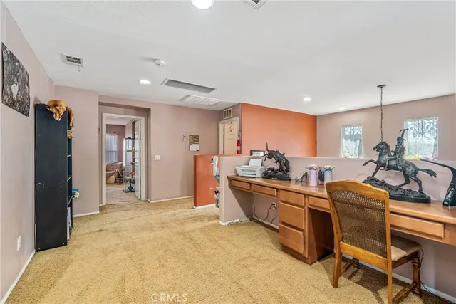 a living room with furniture window and a table