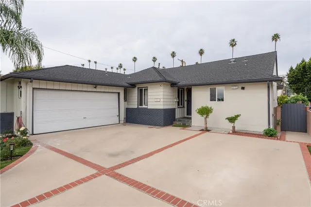 a front view of a house with a garage
