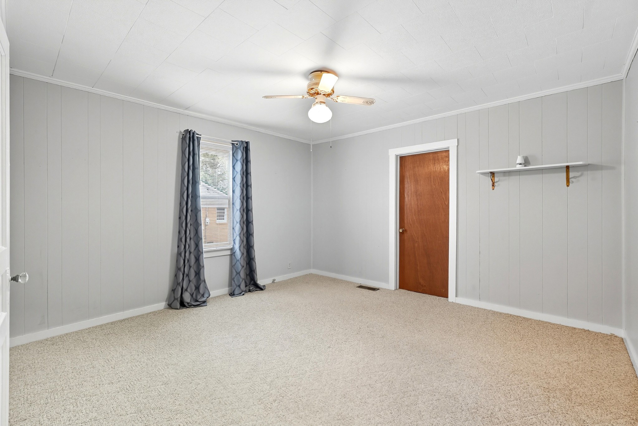 135 Main Street McEwen, TN 37101 - Photo 30 of 62 an empty room with windows and closet