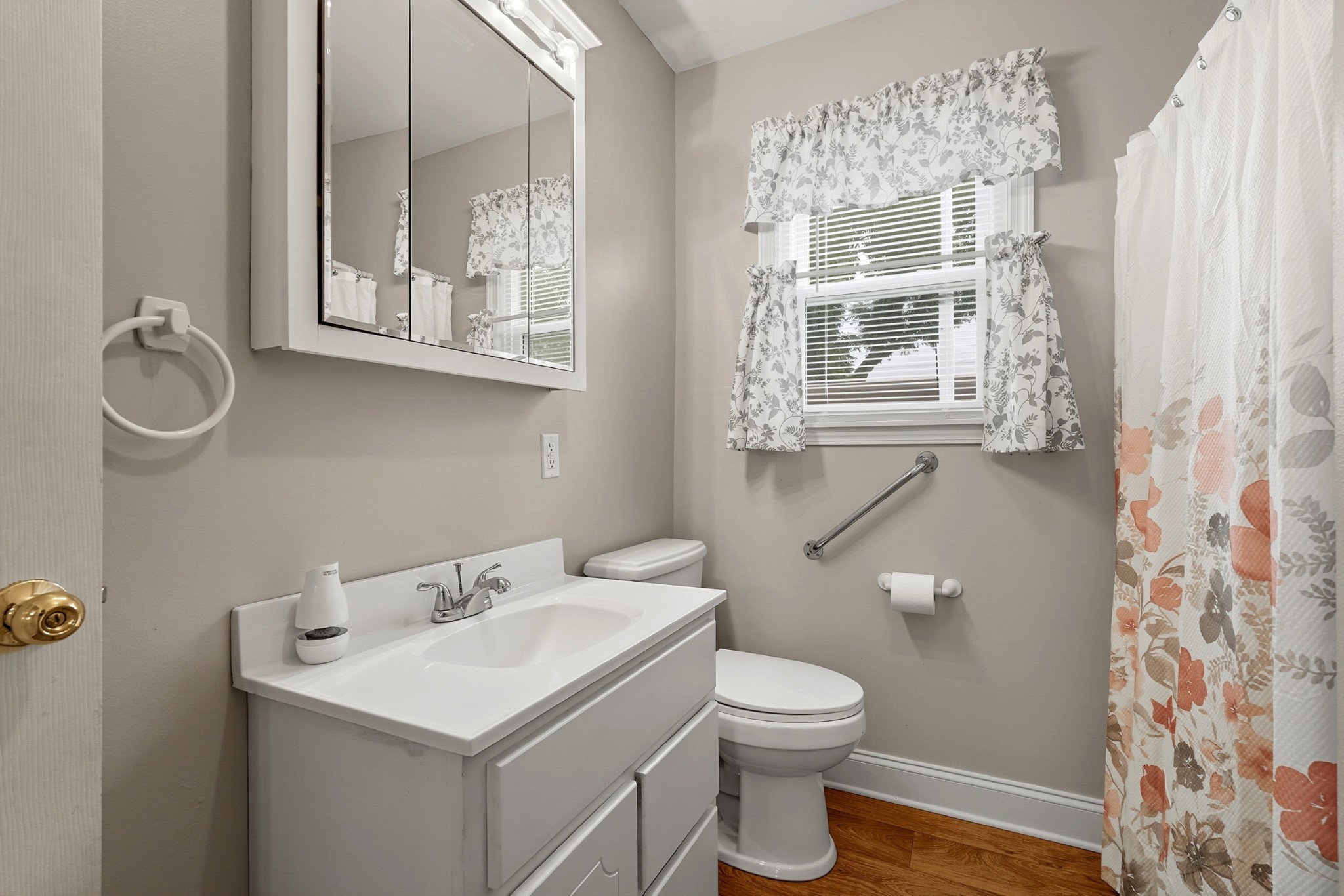 135 Main Street McEwen, TN 37101 - Photo 33 of 62 a bathroom with a toilet sink and mirror