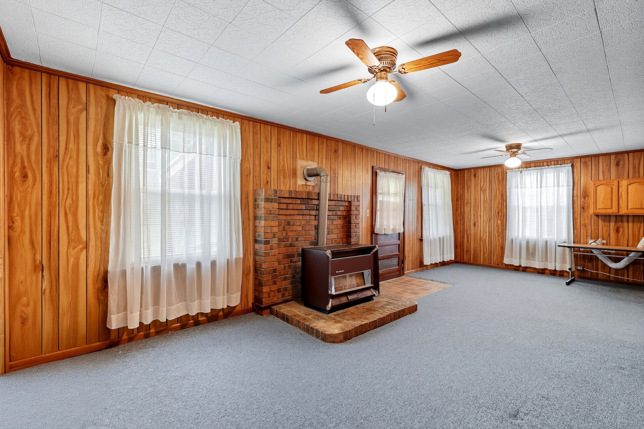 135 Main Street McEwen, TN 37101 - Photo 40 of 62 a room with gym equipment and a large window