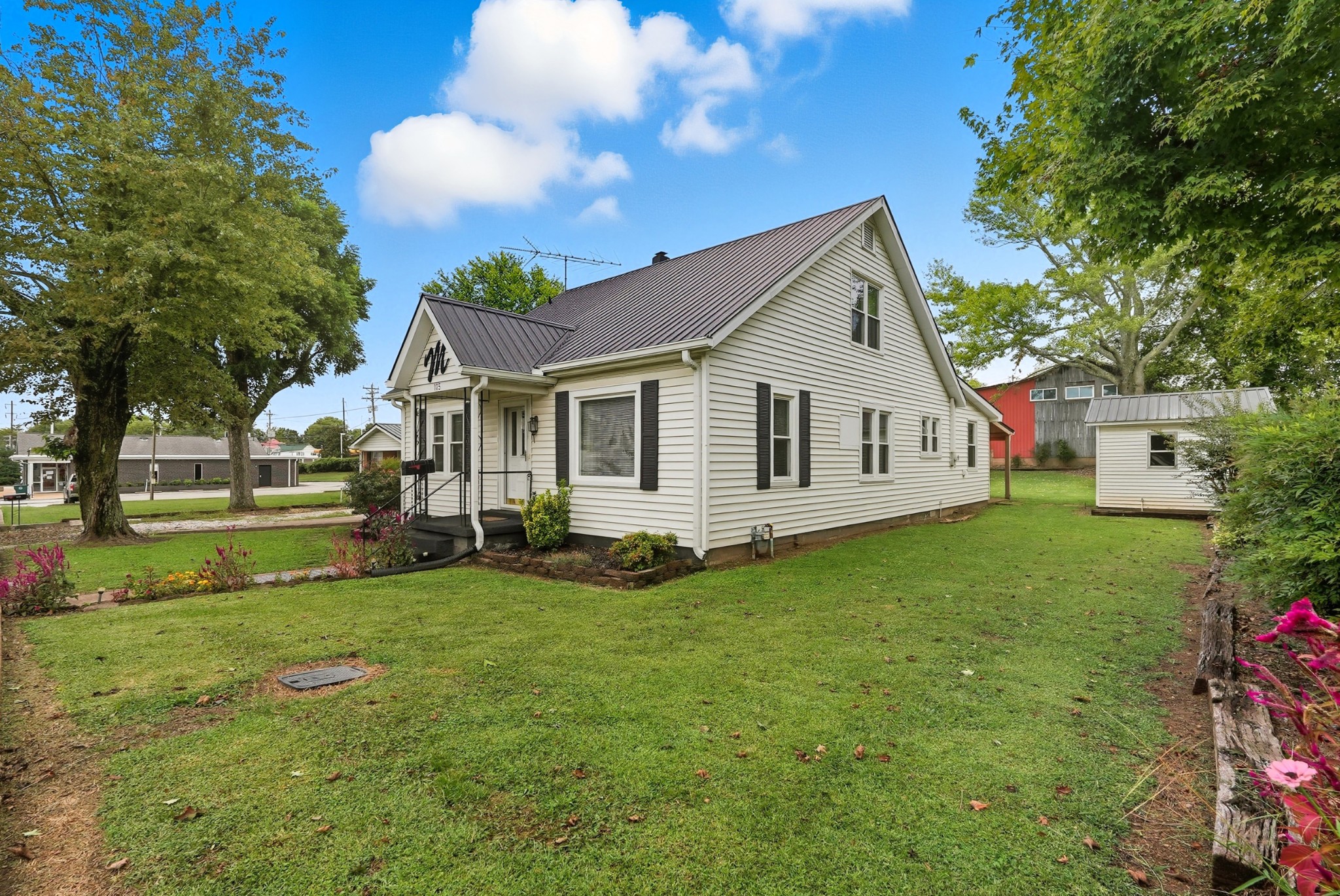 135 Main Street McEwen, TN 37101 - Photo 5 of 62 a view of a house with a big yard