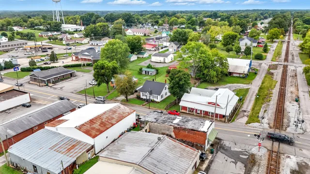 an aerial view of a house with a garden