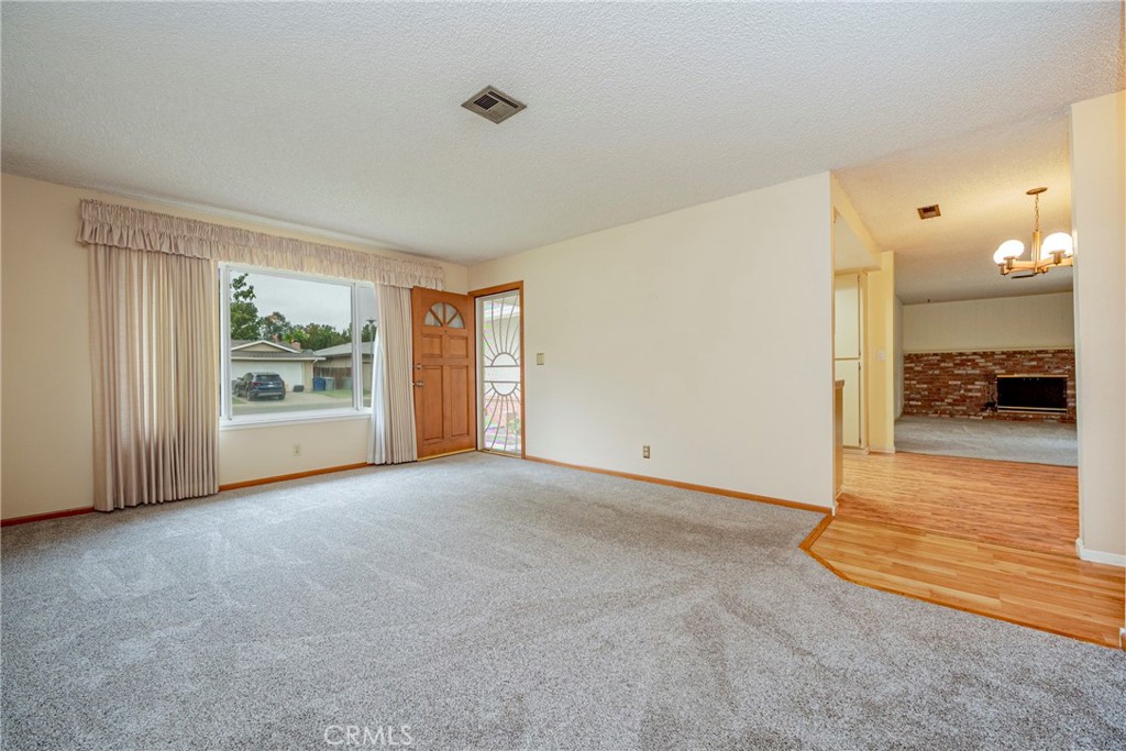 3449 Bautista Court Merced, CA 95348 - Photo 18 of 41 a view of an empty room with window and a living room