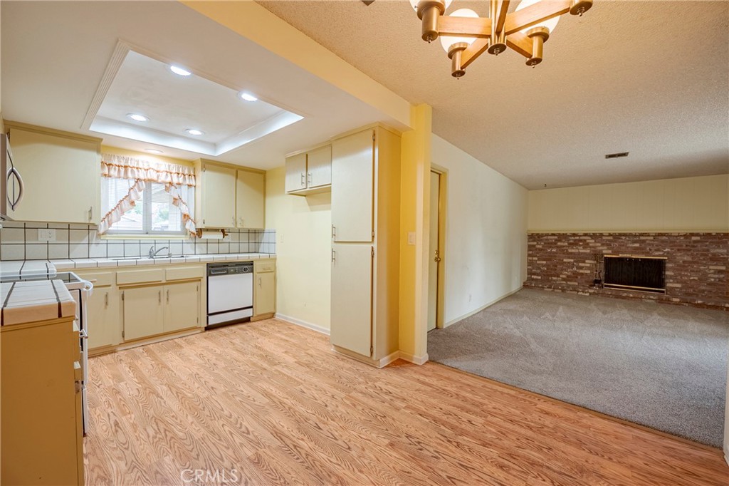 3449 Bautista Court Merced, CA 95348 - Photo 20 of 41 a kitchen with a refrigerator and a sink