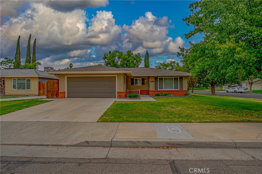 3449 Bautista Court Merced, CA 95348 - Photo 2 of 41 a front view of a house with a yard