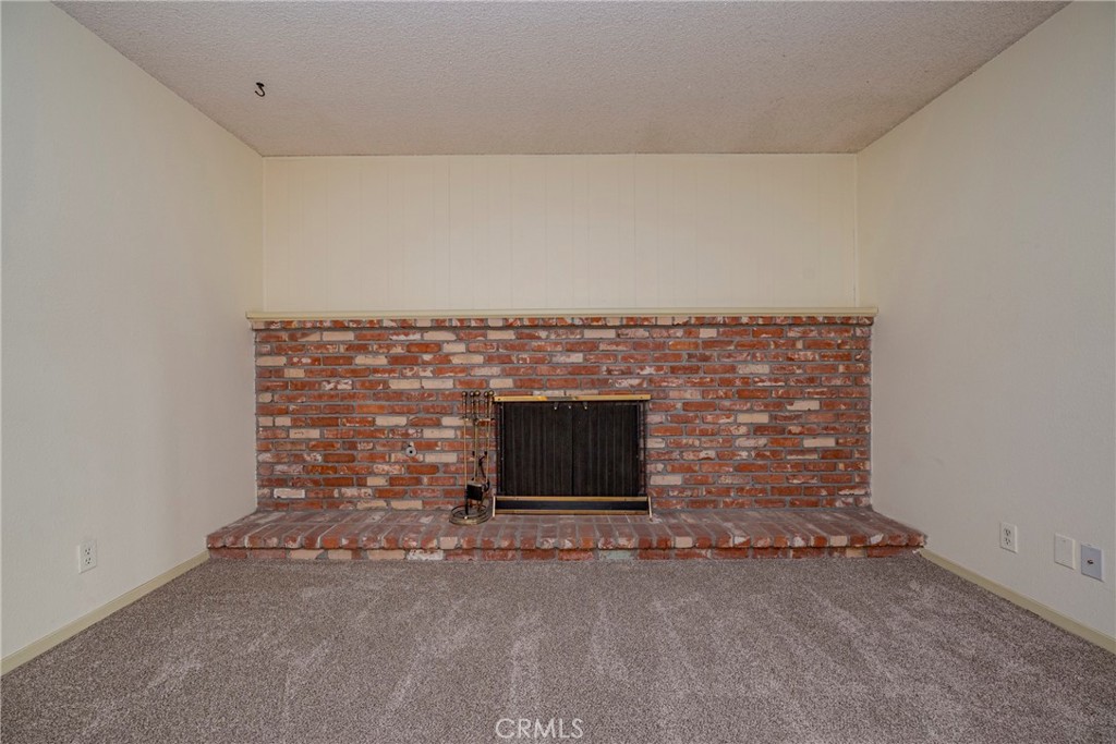 3449 Bautista Court Merced, CA 95348 - Photo 28 of 41 a room with a fireplace
