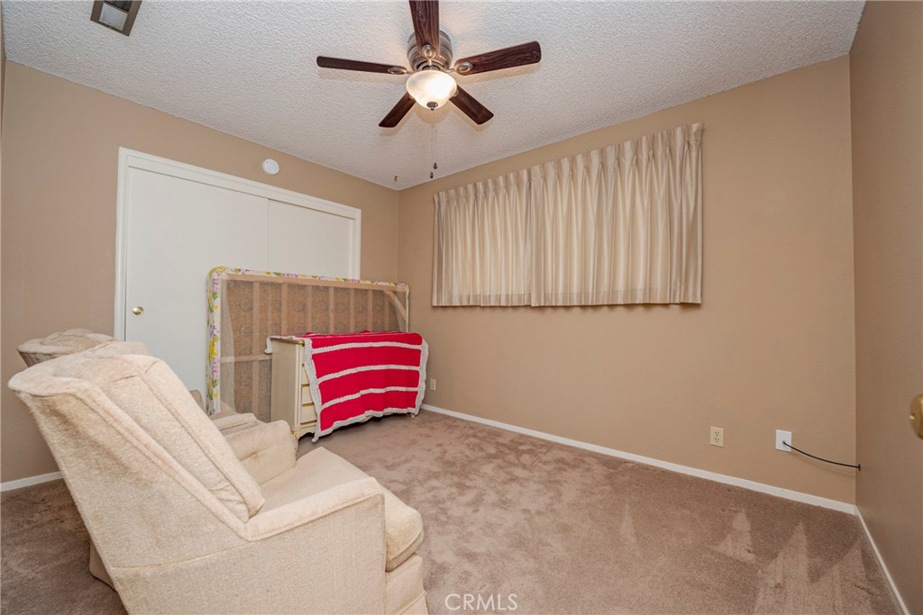 3449 Bautista Court Merced, CA 95348 - Photo 32 of 41 a living room with furniture