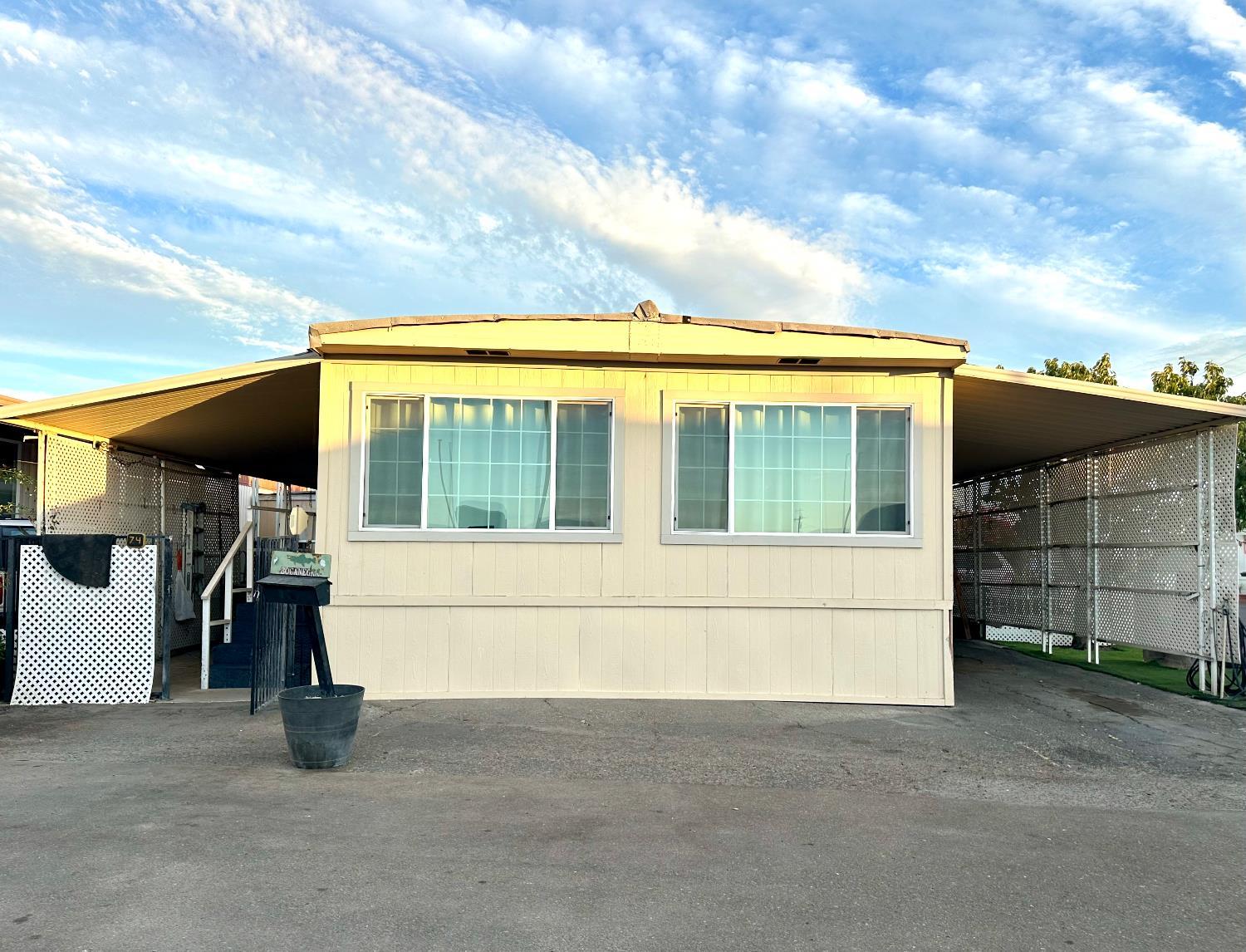 3435 Marfargoa Road, Unit 74 Stockton, CA 95215 - Photo 21 of 21 a view of house with a outdoor space