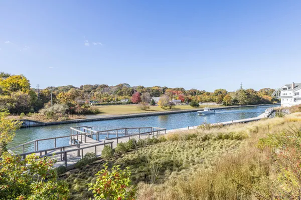 a view of a lake with a houses