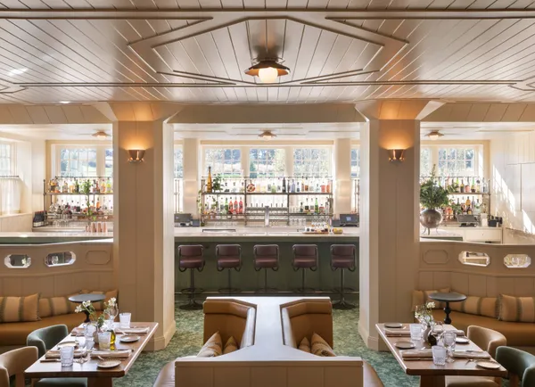 a kitchen with a window and cabinets