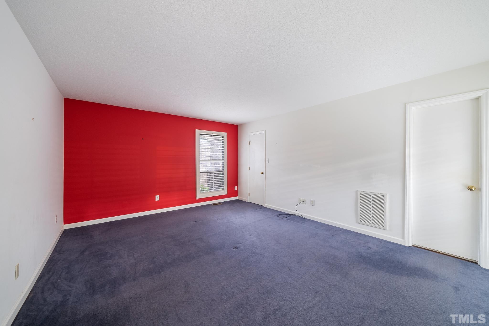 2742 Rue Sans Famille Raleigh, NC 27607 - Photo 11 of 21 an empty room with windows