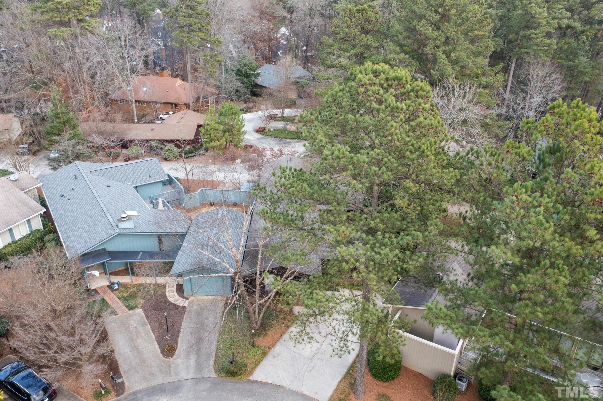 2742 Rue Sans Famille Raleigh, NC 27607 - Photo 20 of 21 an aerial view of a house with a yard basket ball court and outdoor seating