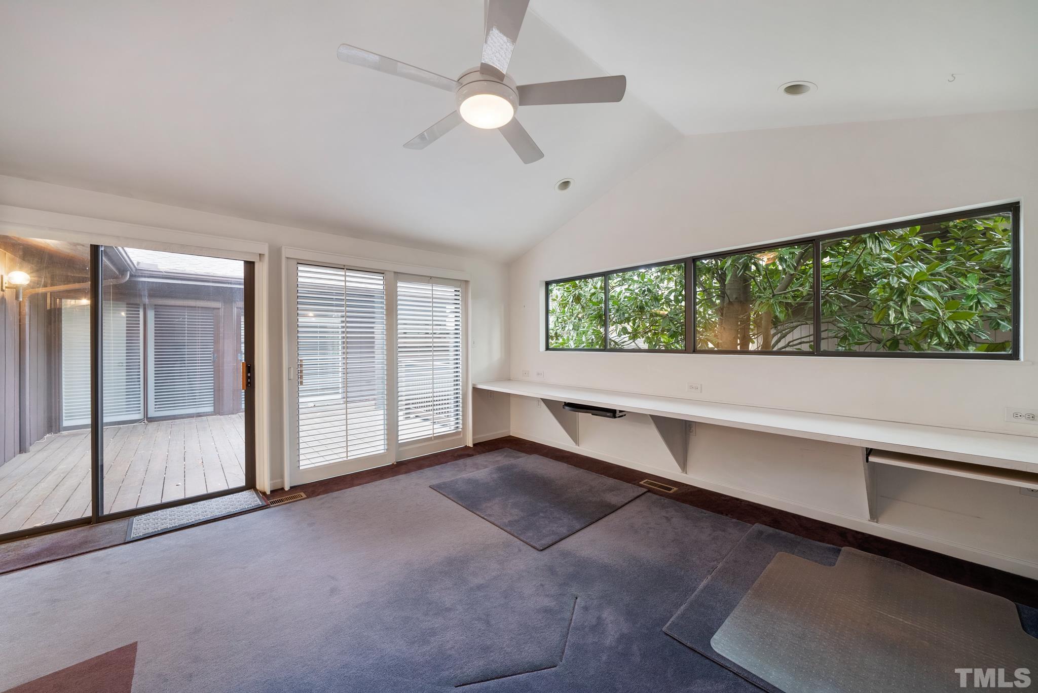 2742 Rue Sans Famille Raleigh, NC 27607 - Photo 10 of 21 a view of an empty room with a window