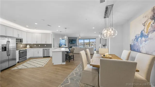 $1,195,000 | 166 Captiva Drive, Unit 1E, Sunrise Beach, MO 65079