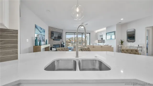 $1,195,000 | 166 Captiva Drive, Unit 1E, Sunrise Beach, MO 65079