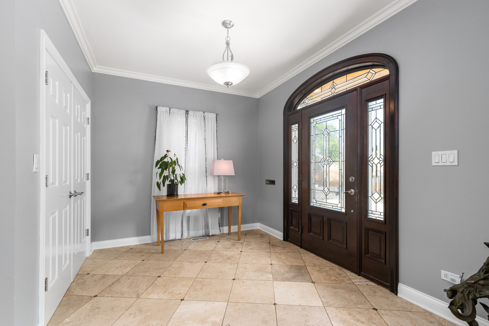 6972 West Imlay Street Chicago, IL 60631 - Photo 2 of 42 a view of entryway with livingroom