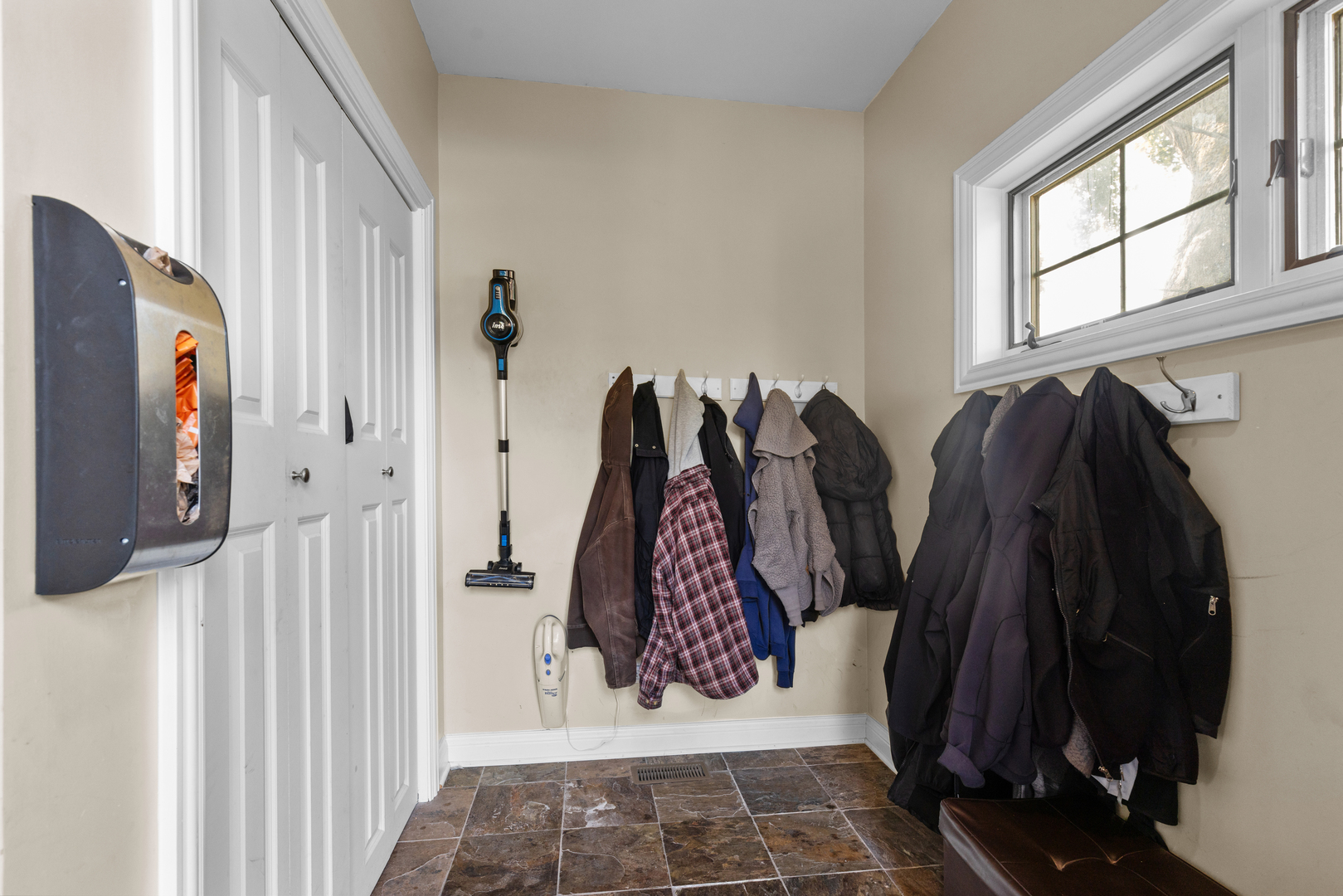 6972 West Imlay Street Chicago, IL 60631 - Photo 38 of 42 a room with a walk in closet and wooden floor