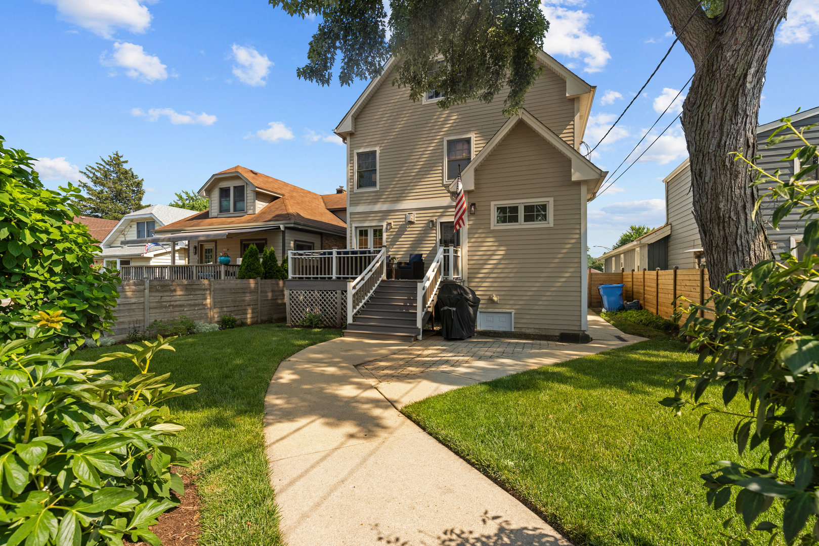 6972 West Imlay Street Chicago, IL 60631 - Photo 41 of 42 a front view of a house with a yard