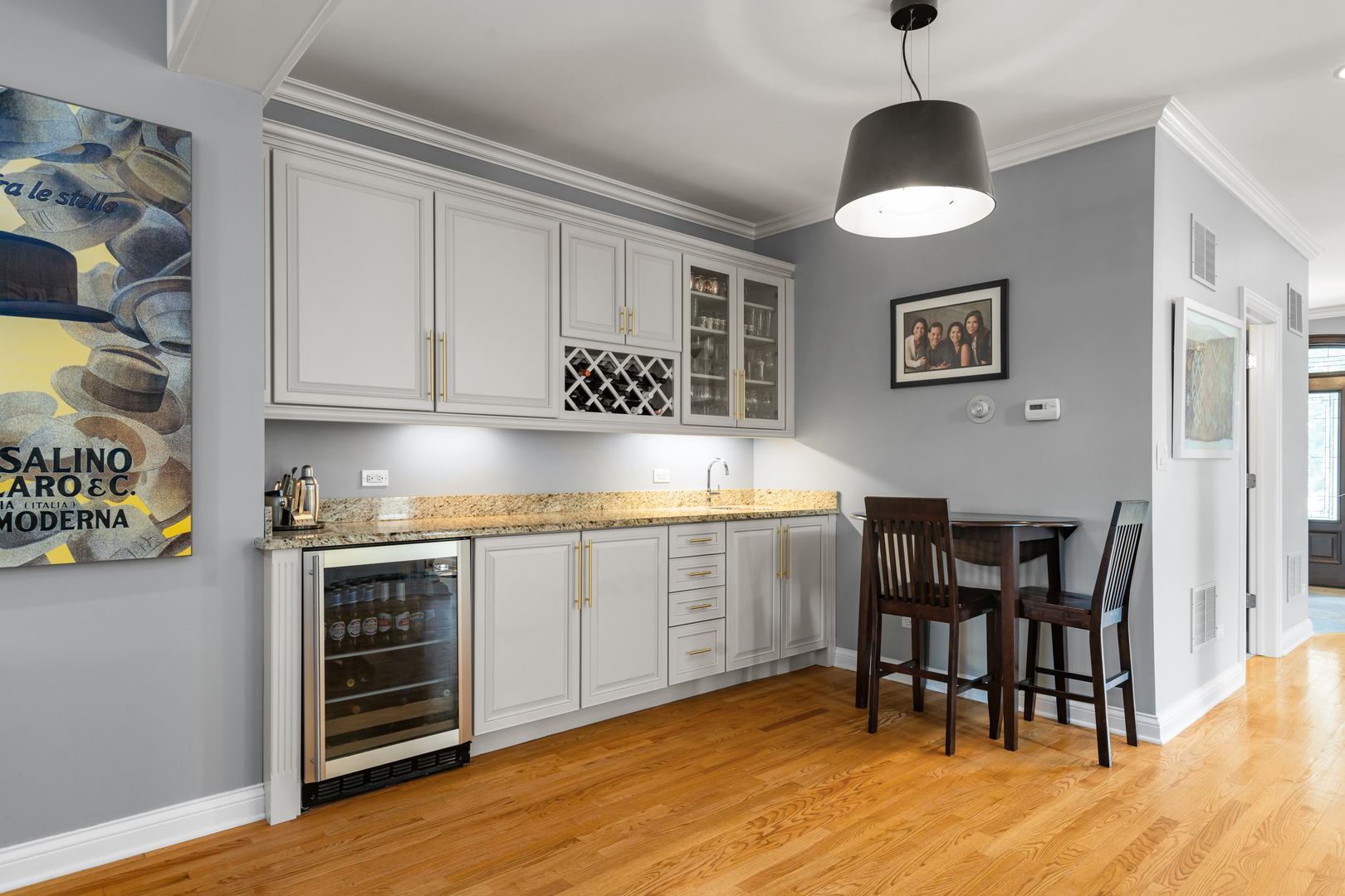 6972 West Imlay Street Chicago, IL 60631 - Photo 6 of 42 a kitchen with stainless steel appliances granite countertop a stove and a wooden floors