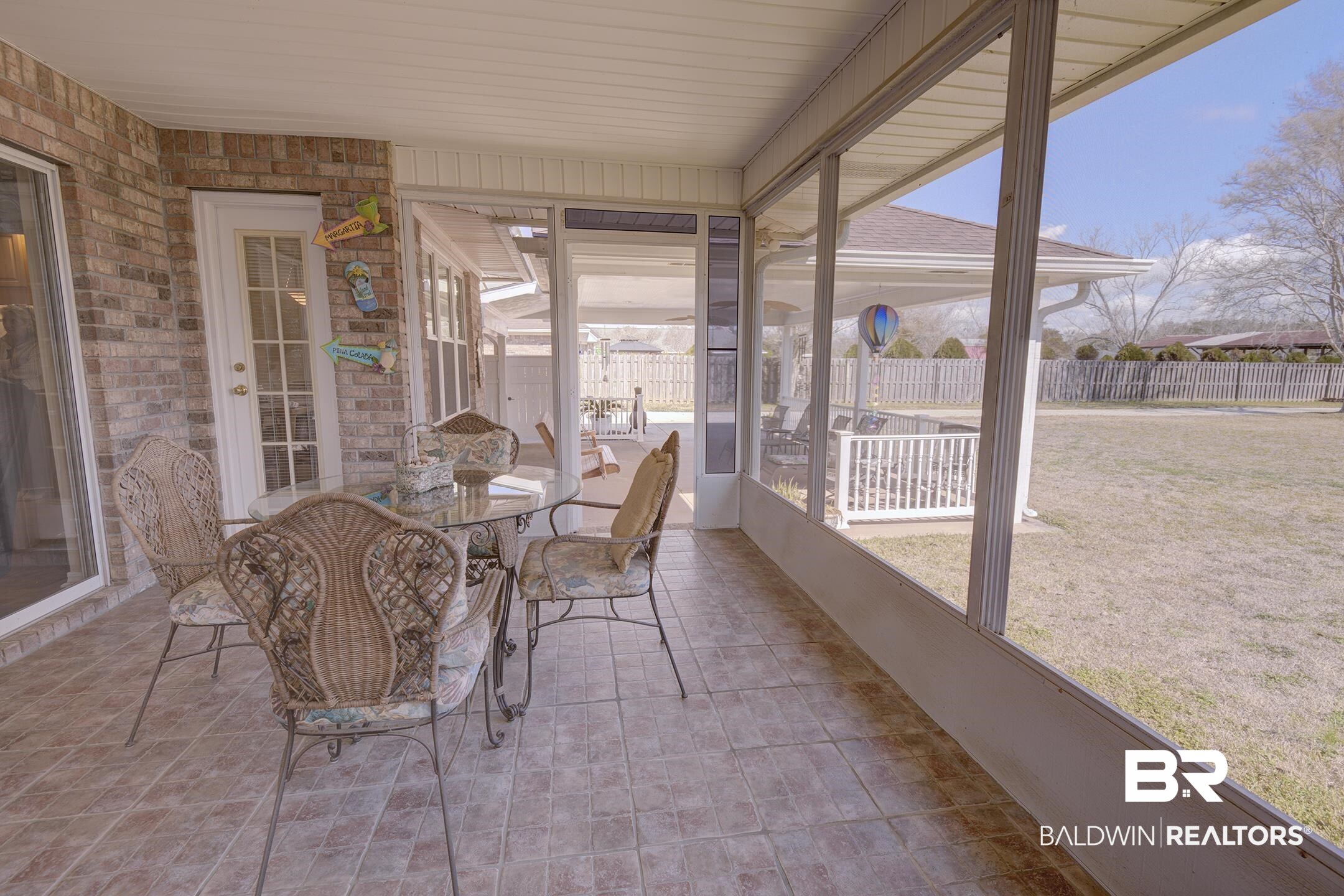 12626 Hunters Chase Foley, AL 36535 - Photo 28 of 40 Sunroom featuring outdoor dining area