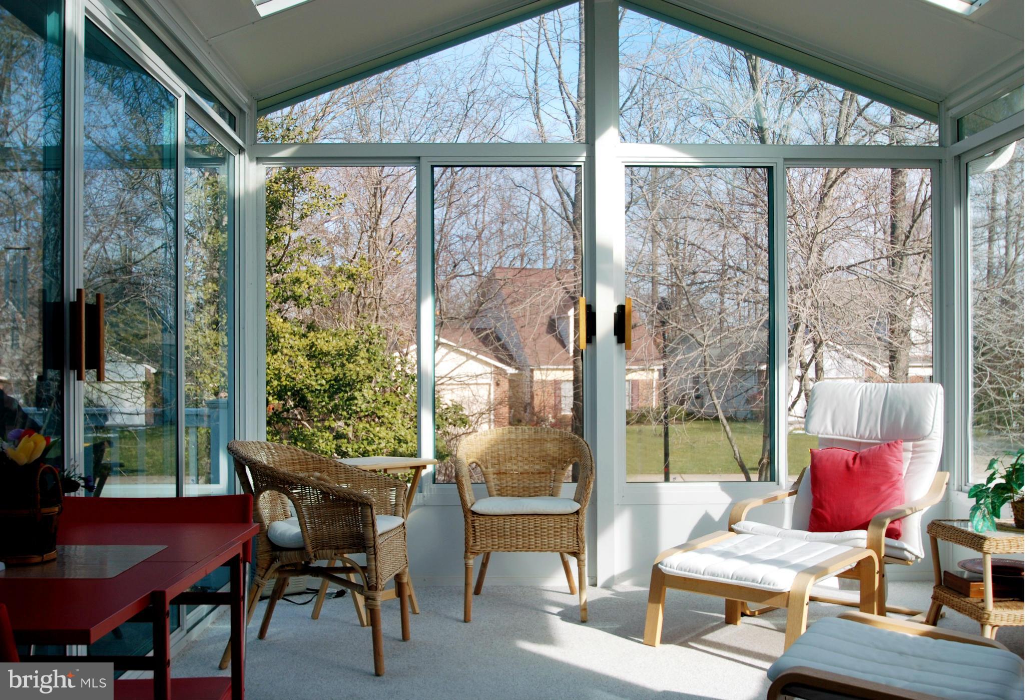 Unique Glass Encased Skylit Sunroom