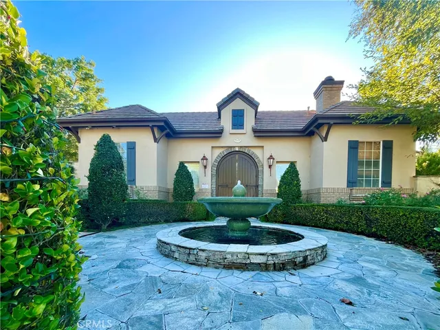 a house view with a garden space