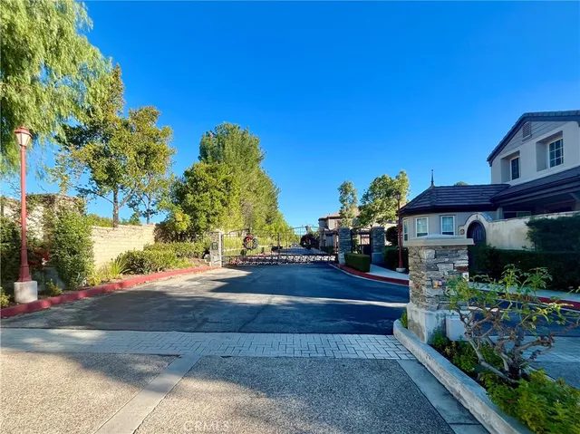 a view of street along with trees