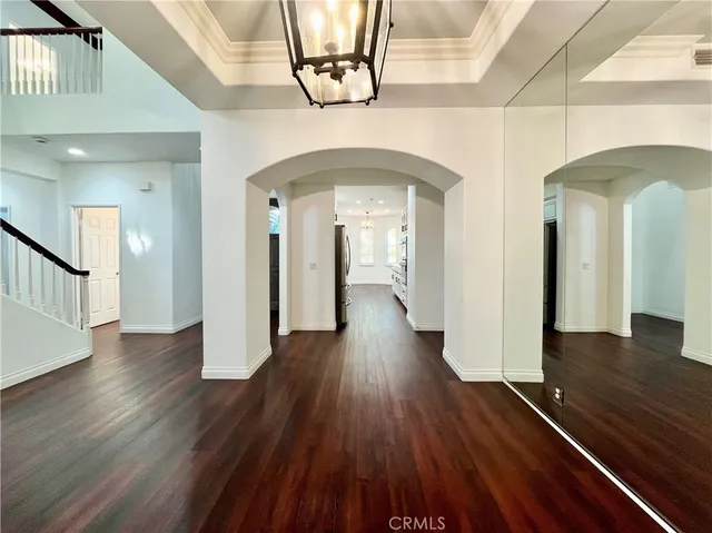 a view of gallery with wooden floor