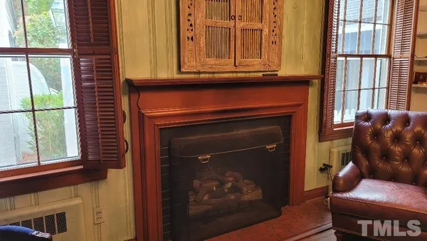 a kitchen with a stove and a refrigerator