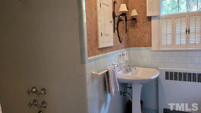 a bathroom with a toilet and a sink
