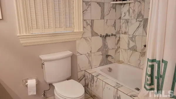 a view of backyard with green space