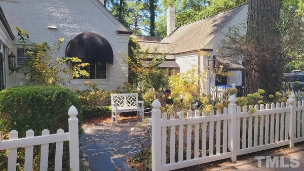 a view of a room with wooden floor and staircase