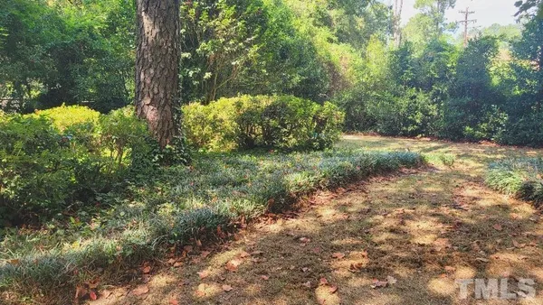 a bathroom with a sink double vanity and a mirror