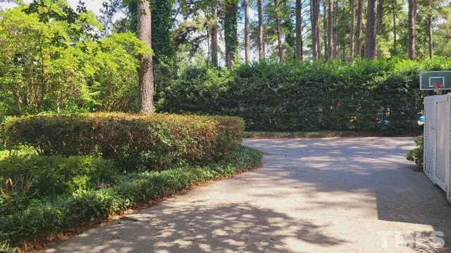 a bathroom with a sink a mirror and a toilet