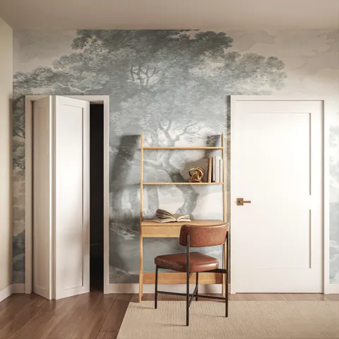 a kitchen with a refrigerator and table chair