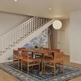 a view of a chairs and table in a patio
