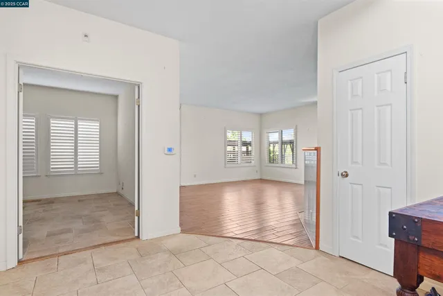 a bathroom with a sink and cabinets