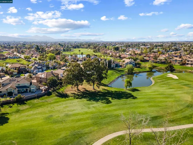 a picture of a bench in front of a building