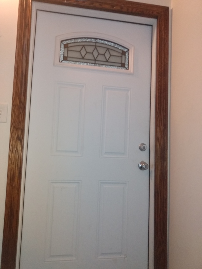 8015 South May Street Chicago, IL 60620 - Photo 12 of 23 a close up of a door