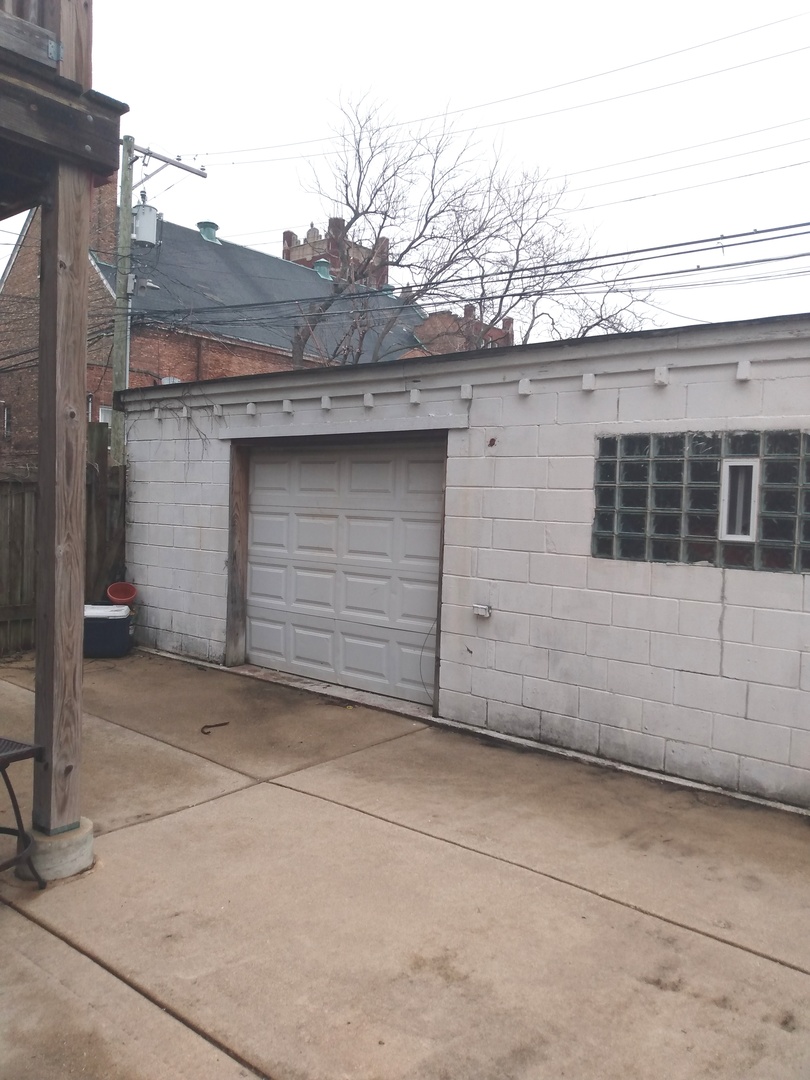 8015 South May Street Chicago, IL 60620 - Photo 23 of 23 a backyard of a house