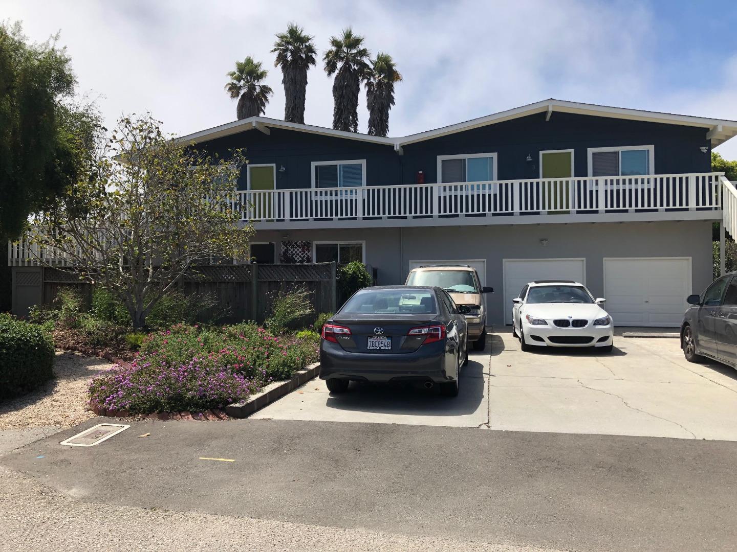 a car parked in front of a house