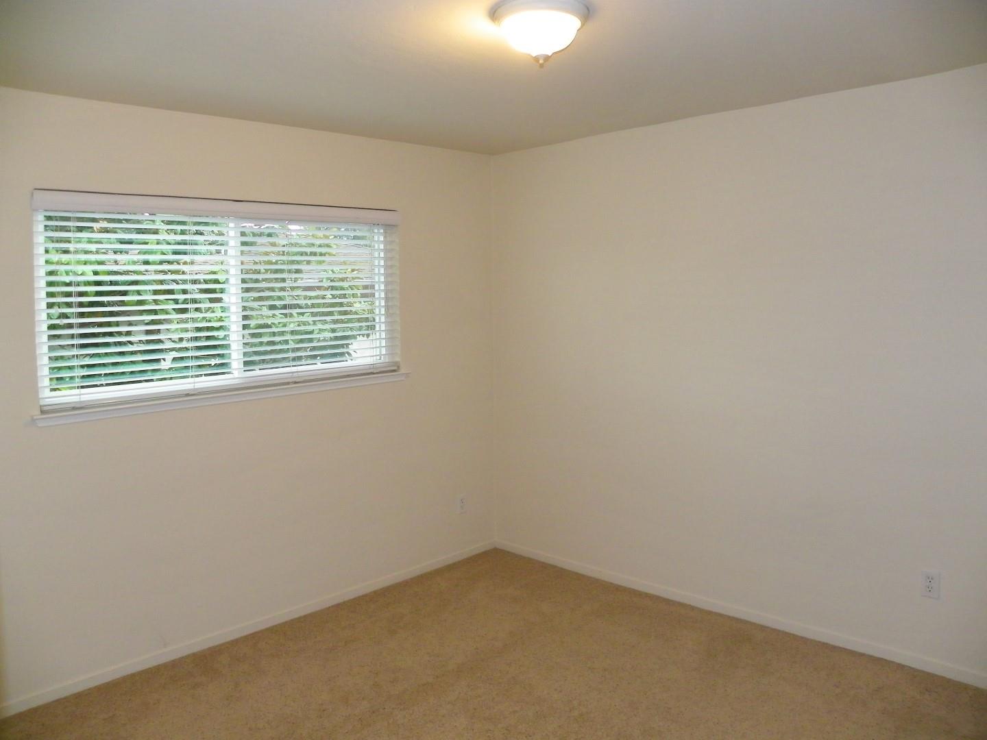 5098 Wilder Drive Soquel, CA 95073 - Photo 12 of 17 an empty room with a window