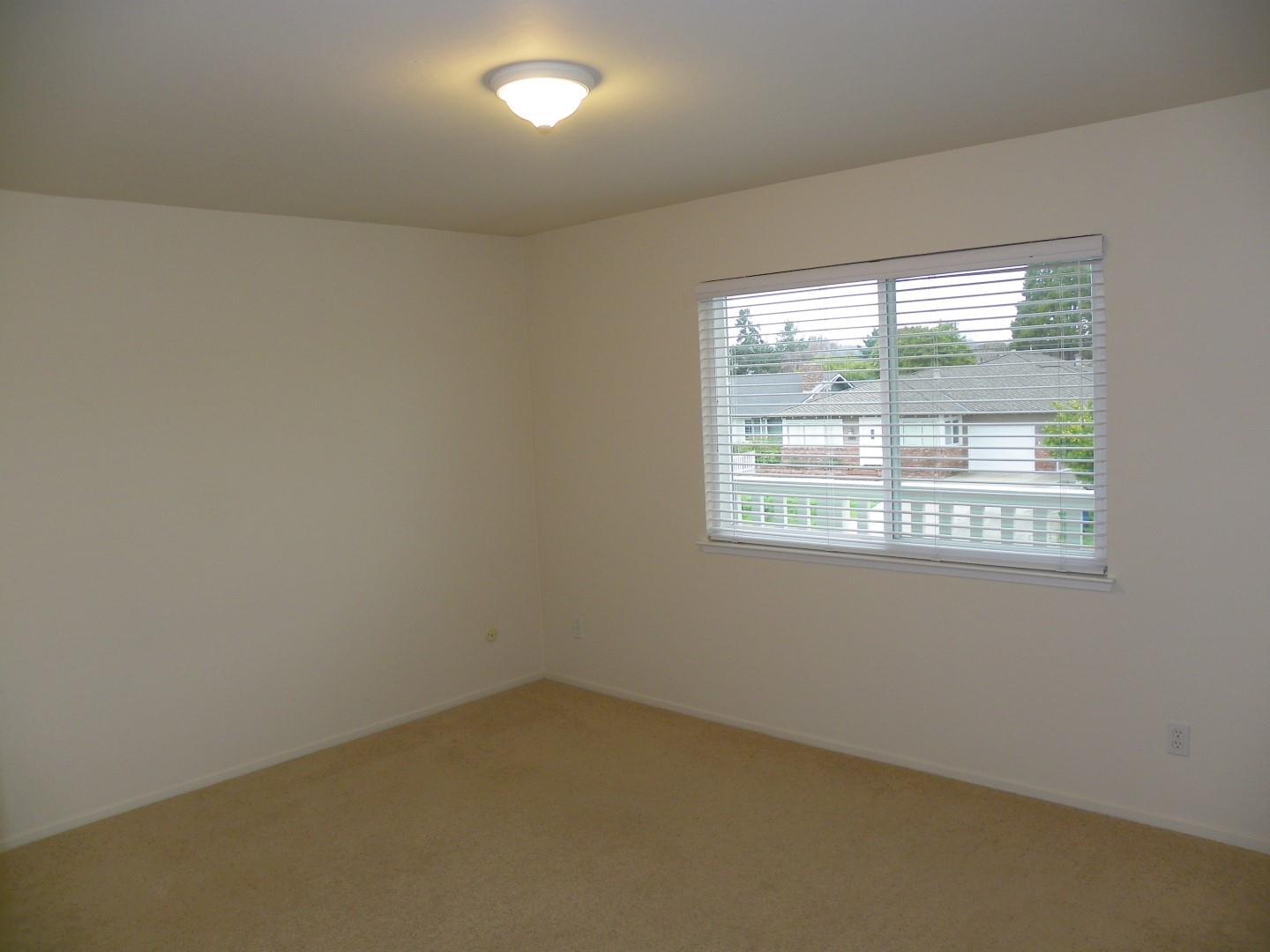 5098 Wilder Drive Soquel, CA 95073 - Photo 13 of 17 an empty room with a window