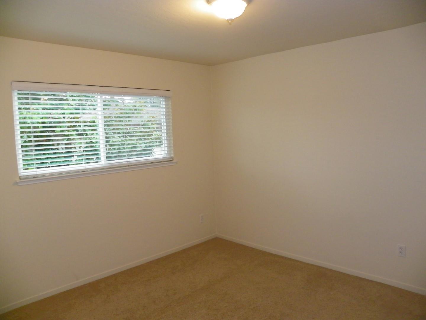 5098 Wilder Drive Soquel, CA 95073 - Photo 14 of 17 an empty room with a window