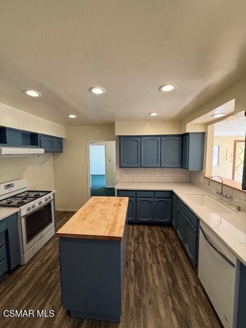 94 Reposo Drive Oak View, CA 93022 - Photo 5 of 18 a kitchen with a sink and a stove top oven