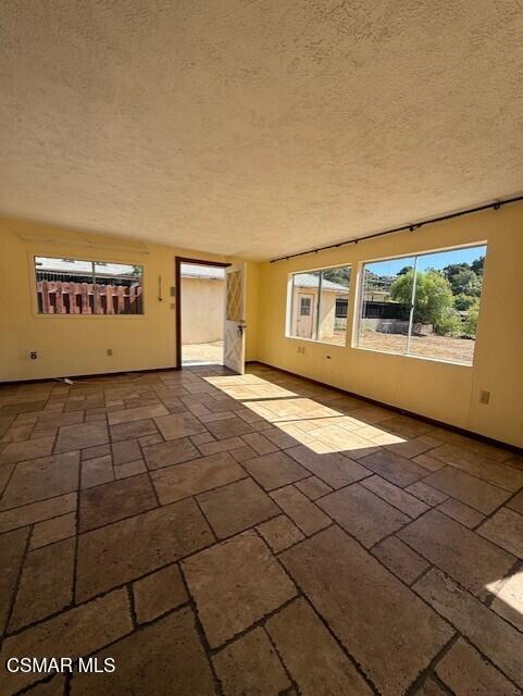 94 Reposo Drive Oak View, CA 93022 - Photo 8 of 18 a view of a livingroom with an empty space and a window