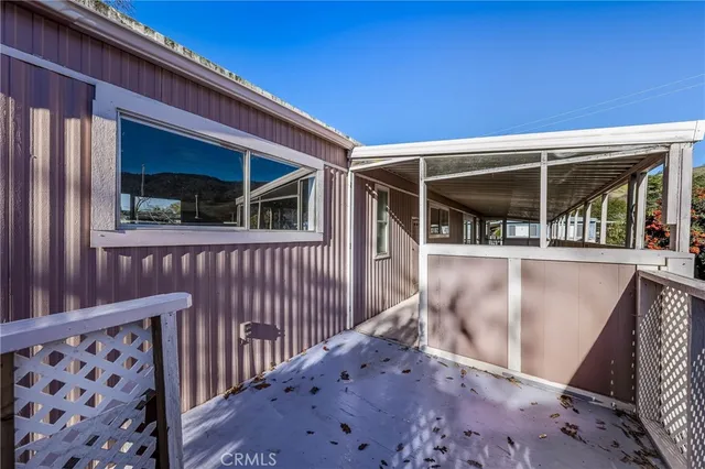 a view of a back yard of the house